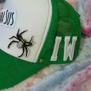 Custom or pre-made hats. Interchangeable attachments, pins and jewelry.